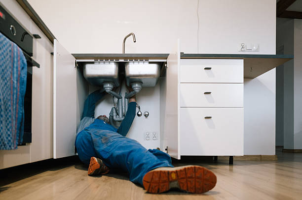 Professional Emergency Plumber technician working in Axton, VA